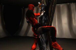 Deadpool sendo passivo e fazendo o Homem-Aranha de submisso