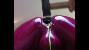 Fistfuck in rubber gay tube