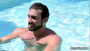 Hot gays guys kissing pool