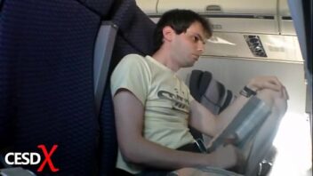 Punheta gay no avião