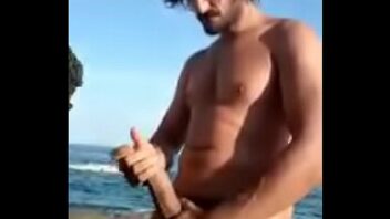 Handjob big dick gay on the beach